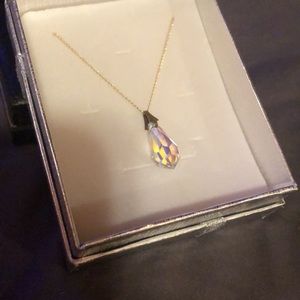 GIRLS SMALL Crystal necklace. Shines in blue,pink.yellow and green.